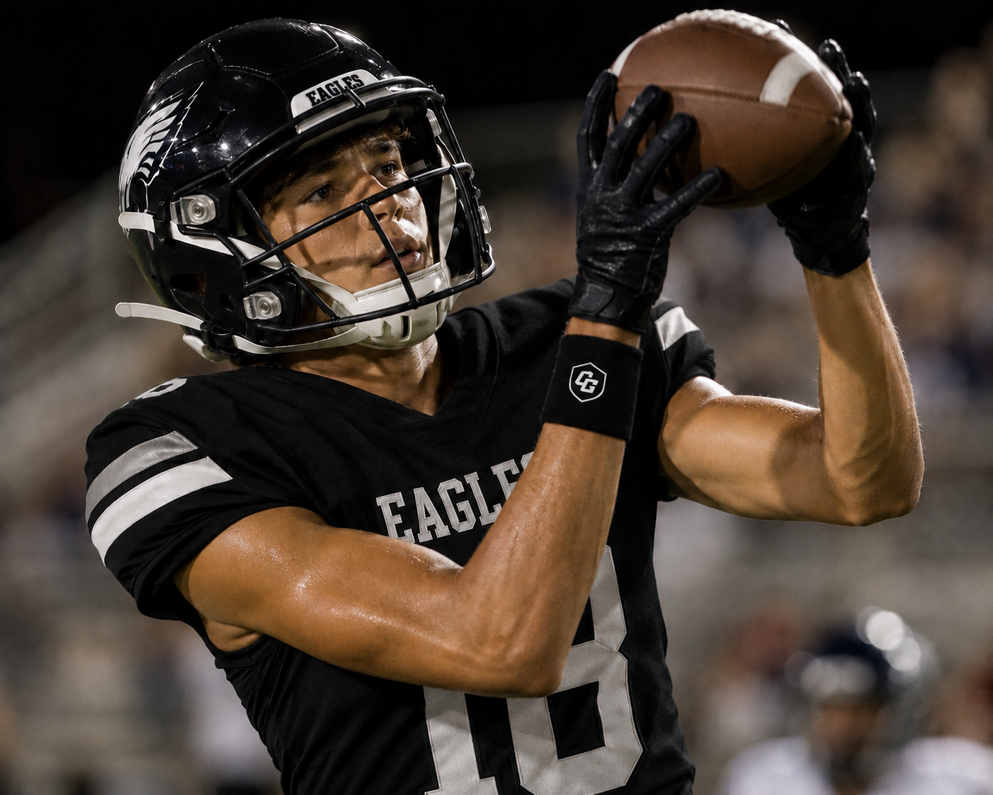 Football athlete wearing Clutch Guard