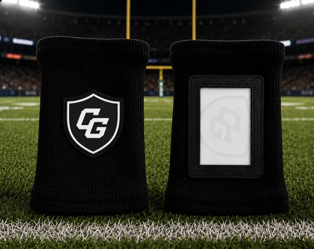 Black 6 inch Clutch Guard wristbands on a football field