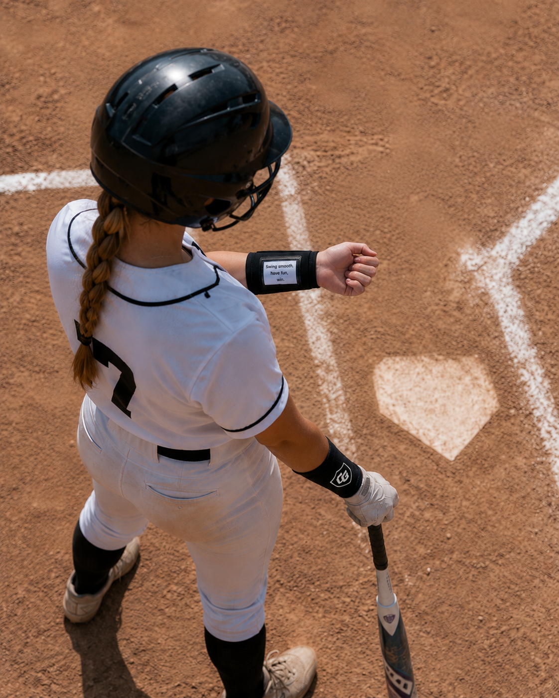 Softball athlete wearing Clutch Guard